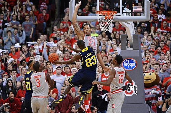 Zak Irvin (21) and Caris LeVert (23)
