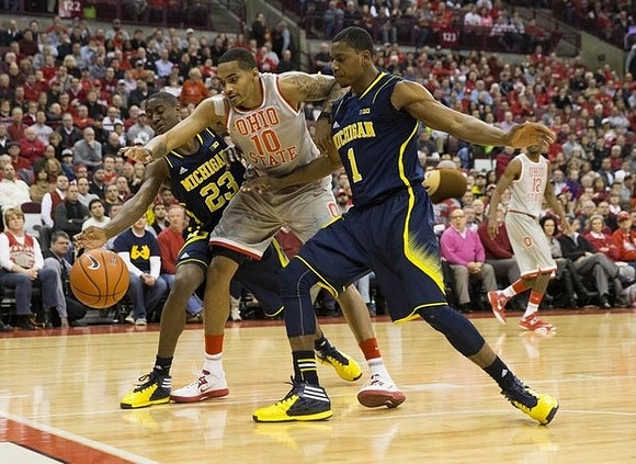 Caris LeVert (23) and Glenn Robinson III (1)