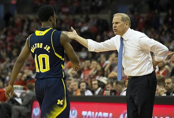 Derrick Walton Jr. (10) and John Beilein