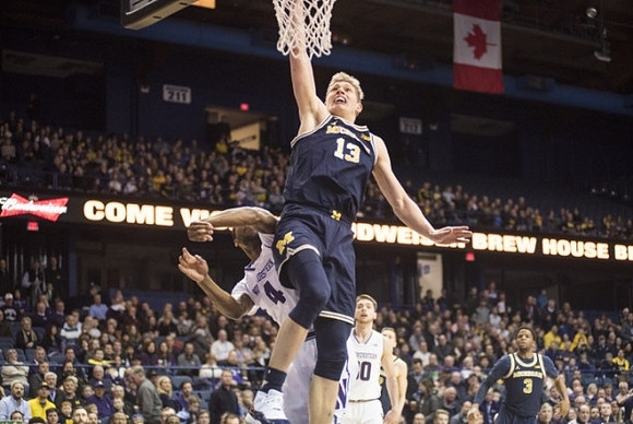 Moritz Wagner (13) and Zavier Simpson (3)