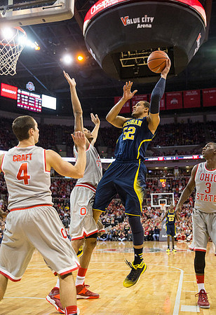 Jordan Morgan (52) and Caris LeVert (23)