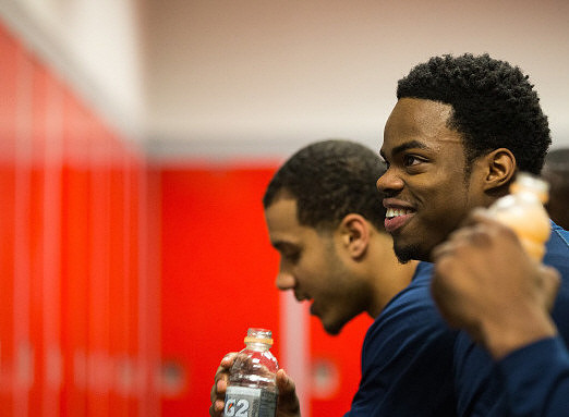 Jordan Morgan (52) and Derrick Walton Jr. (10)