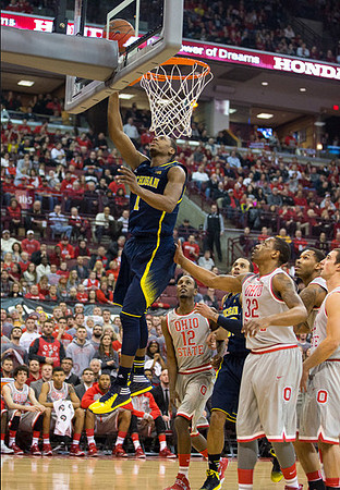 Glenn Robinson III (1) and Jordan Morgan (52)