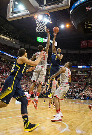 Jordan Morgan (52) and Glenn Robinson III (1)