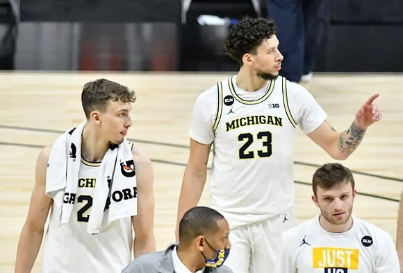 Franz Wagner (21), Howard Eisley, Brandon Johns Jr. (23), and Luke Wilson (32)