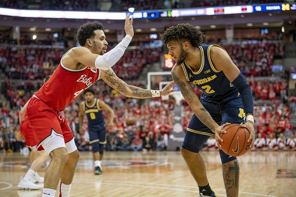 David DeJulius (0) and Isaiah Livers (2)