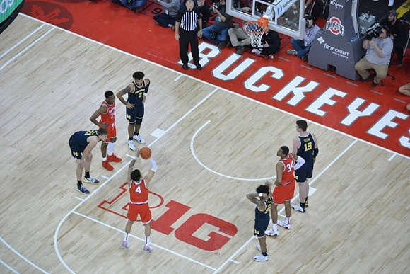 Franz Wagner (21), Isaiah Livers (2), Eli Brooks (55), and Jon Teske (15)