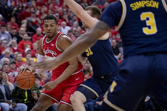 Austin Davis (51) and Zavier Simpson (3)