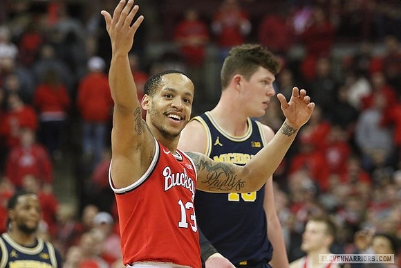 Zavier Simpson (3) and Jon Teske (15)