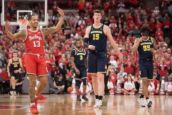 Franz Wagner (21), Zavier Simpson (3), Jon Teske (15), and Eli Brooks (55)