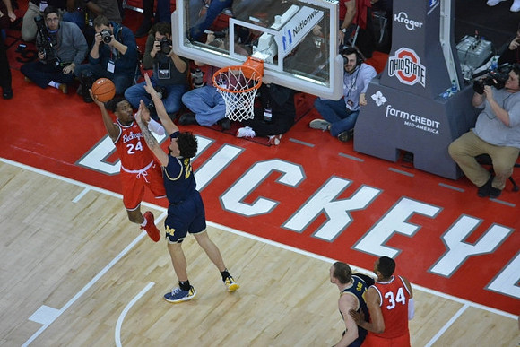 Brandon Johns Jr. (23) and Austin Davis (51)