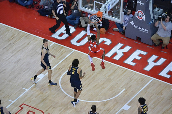 Franz Wagner (21), Isaiah Livers (2), Zavier Simpson (3), and Eli Brooks (55)