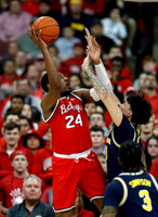Zavier Simpson (3) and Brandon Johns Jr. (23)