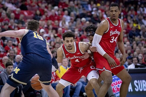 Jon Teske (15) and Eli Brooks (55)
