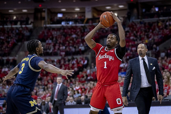 Zavier Simpson (3), Ohio State Head Coach Chris Holtmann, and Juwan Howard