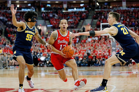 Eli Brooks (55) and Franz Wagner (21)