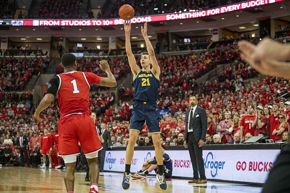 Franz Wagner (21) and Juwan Howard