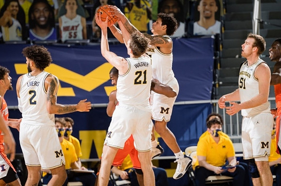 Isaiah Livers (2), Franz Wagner (21), Eli Brooks (55), and Austin Davis (51)