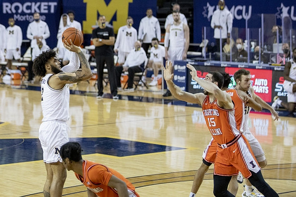 Isaiah Livers (2) and Austin Davis (51)