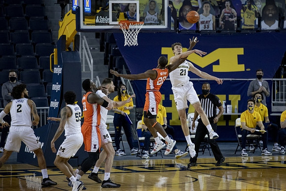 Isaiah Livers (2), Eli Brooks (55), Hunter Dickinson (1), and Franz Wagner (21)