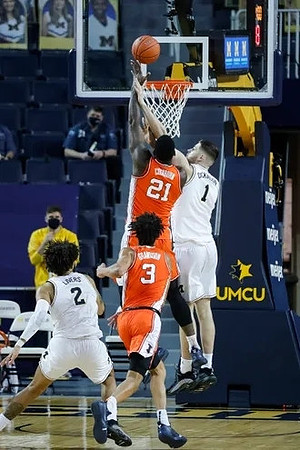 Isaiah Livers (2) and Hunter Dickinson (1)