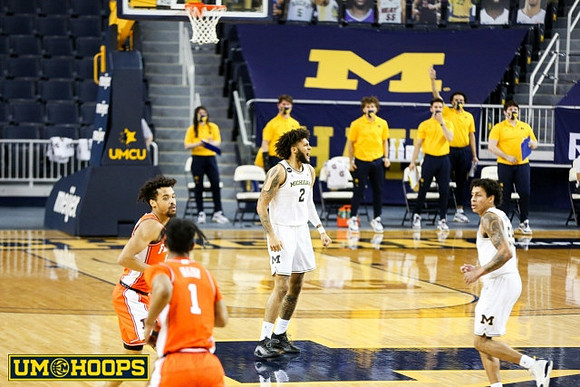 Isaiah Livers (2) and Eli Brooks (55)