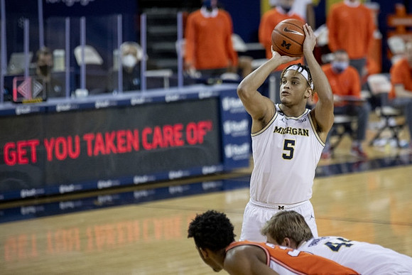 Terrance Williams II (5) and Jaron Faulds (44)
