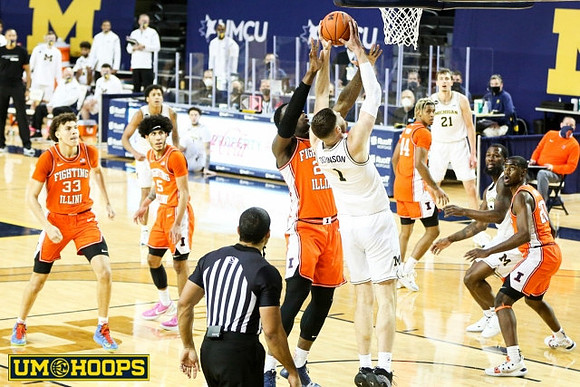 Hunter Dickinson (1), Eli Brooks (55), Franz Wagner (21), and Chaundee Brown Jr. (15)