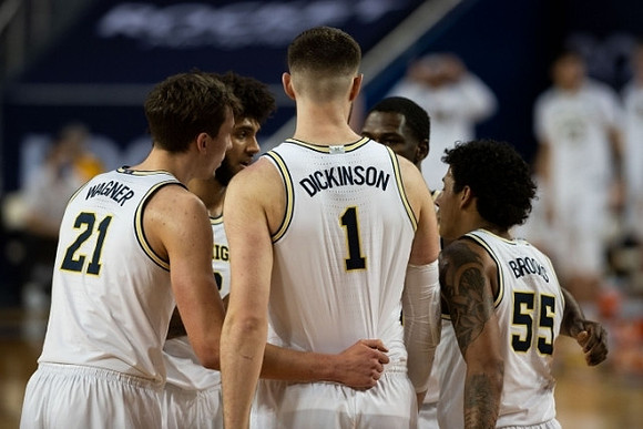 Franz Wagner (21), Isaiah Livers (2), Hunter Dickinson (1), Chaundee Brown Jr. (15), and Eli Brooks (55)