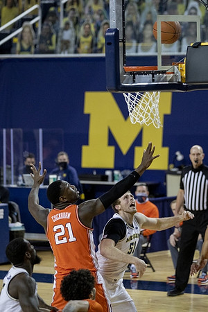 Chaundee Brown Jr. (15) and Austin Davis (51)