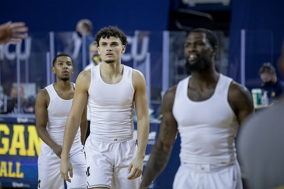 Rico Ozuna-Harrison (14), Adrien Nunez (0), and Chaundee Brown Jr. (15)