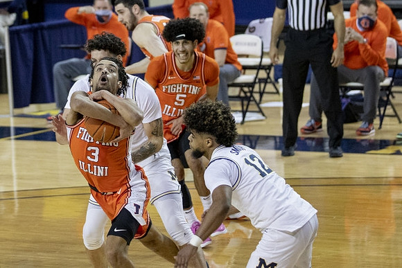 Brandon Johns Jr. (23) and Mike Smith (12)