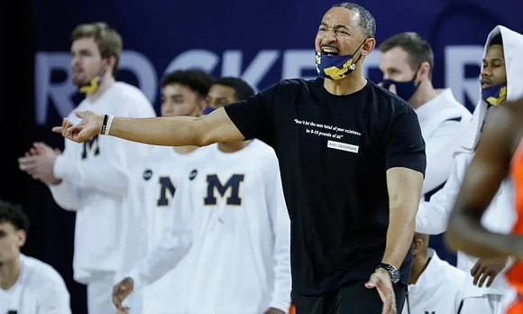 Juwan Howard and Michigan Team