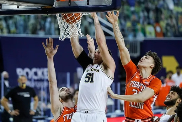 Austin Davis (51) and Isaiah Livers (2)