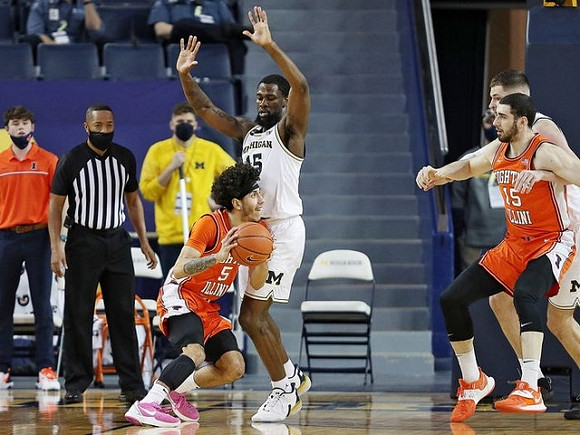 Chaundee Brown Jr. (15) and Hunter Dickinson (1)