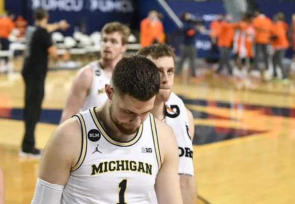 Hunter Dickinson (1), Austin Davis (51), and Jaron Faulds (44)