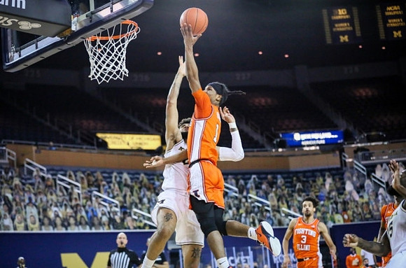 Isaiah Livers (2) and Chaundee Brown Jr. (15)