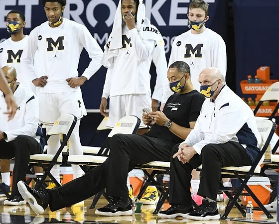 Juwan Howard, Phil Martelli, and Michigan Team