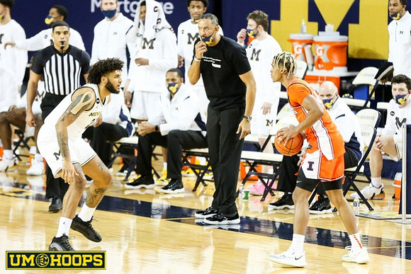 Isaiah Livers (2) and Juwan Howard