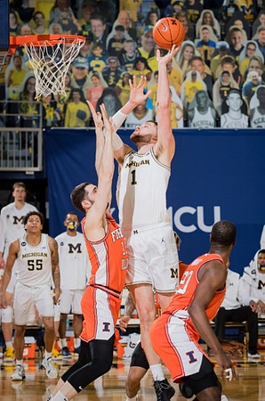 Hunter Dickinson (1) and Eli Brooks (55)