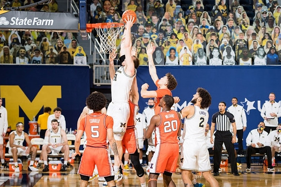 Austin Davis (51) and Isaiah Livers (2)