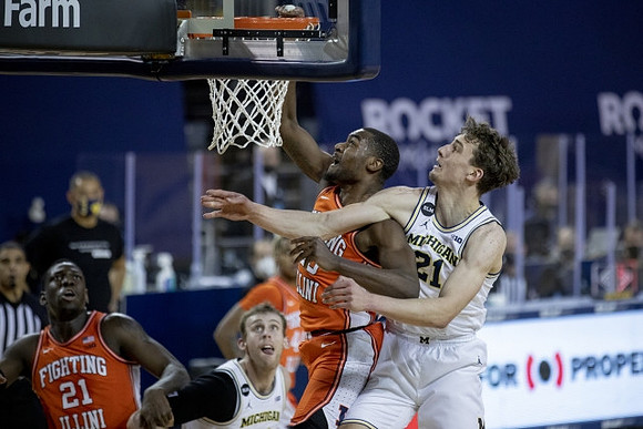 Chaundee Brown Jr. (15) and Austin Davis (51)
