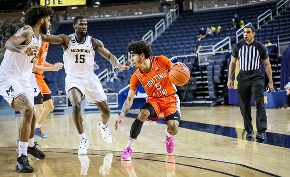 Isaiah Livers (2) and Chaundee Brown Jr. (15)