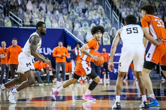 Chaundee Brown Jr. (15) and Eli Brooks (55)