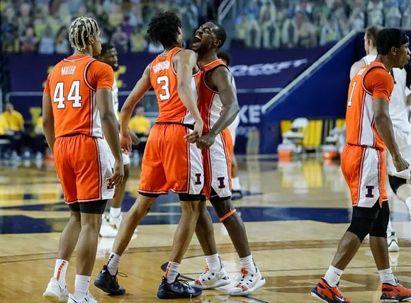 Chaundee Brown Jr. (15) and Austin Davis (51)