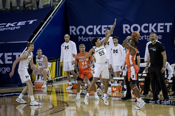 Franz Wagner (21), Eli Brooks (55), and Juwan Howard