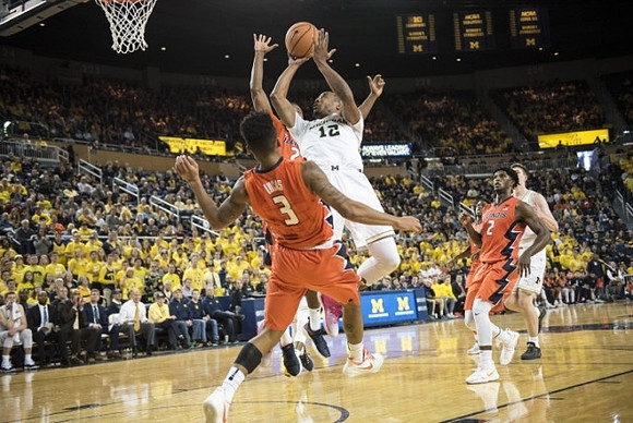 Muhammad-Ali Abdur-Rahkman (12) and Jon Teske (15)