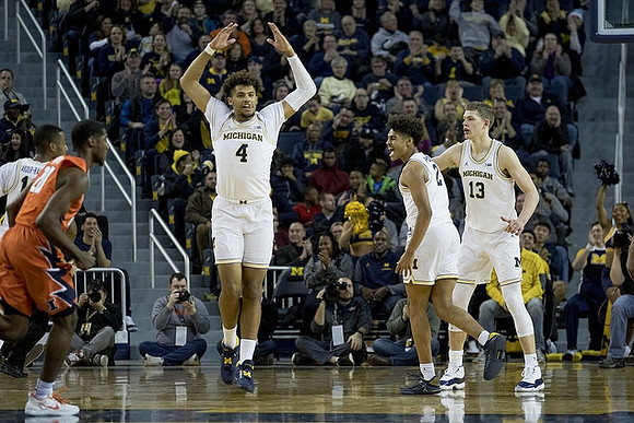 Muhammad-Ali Abdur-Rahkman (12), Isaiah Livers (4), Jordan Poole (2), and Moritz Wagner (13)