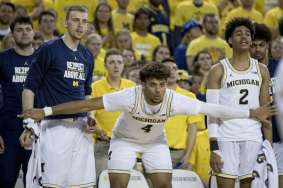 Brent Hibbitts (0), Austin Davis (51), Isaiah Livers (4), and Jordan Poole (2)