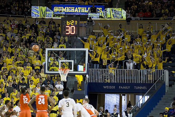 Charles Matthews (1), Isaiah Livers (4), Zavier Simpson (3), and Moritz Wagner (13)